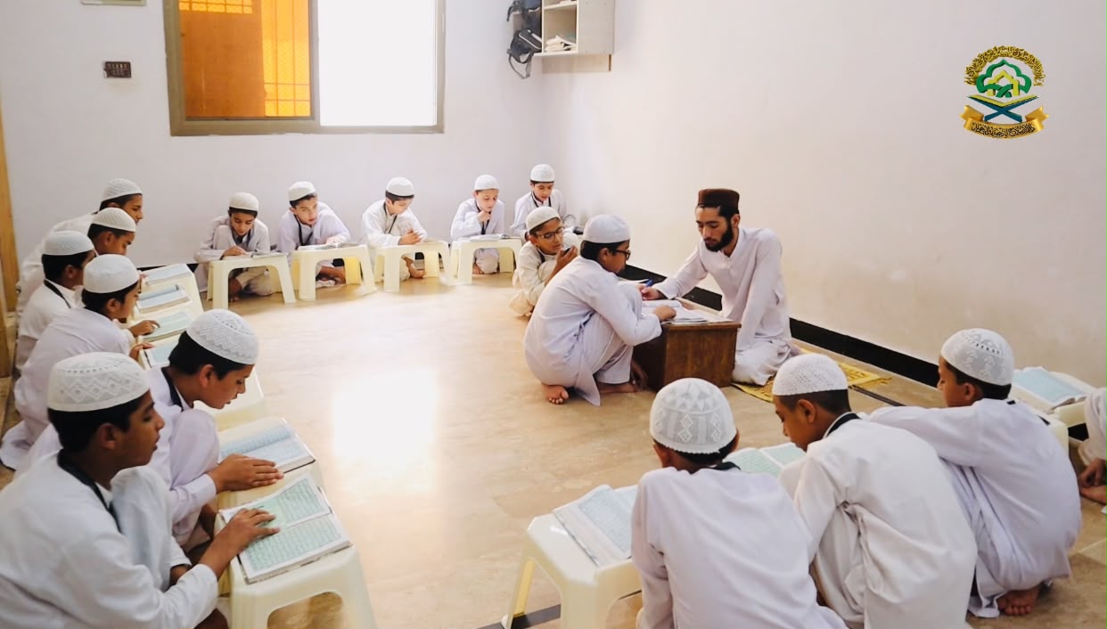 Students studying Quran